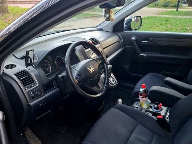 Черный Хонда СРВ, объемом двигателя 2 л и пробегом 308 тыс. км за 9500 $, фото 1 на Automoto.ua