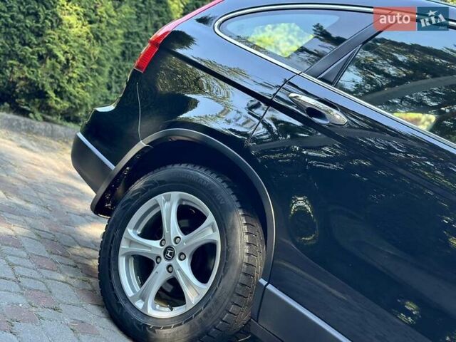 Черный Хонда СРВ, объемом двигателя 2.2 л и пробегом 197 тыс. км за 12800 $, фото 12 на Automoto.ua