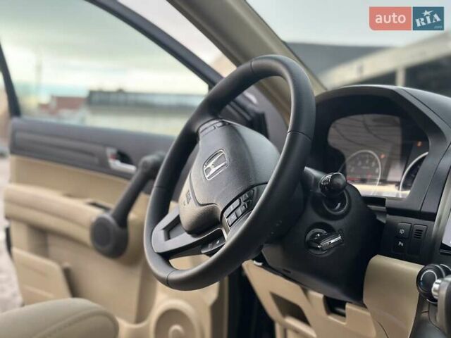 Чорний Хонда СРВ, об'ємом двигуна 2 л та пробігом 181 тис. км за 13777 $, фото 67 на Automoto.ua