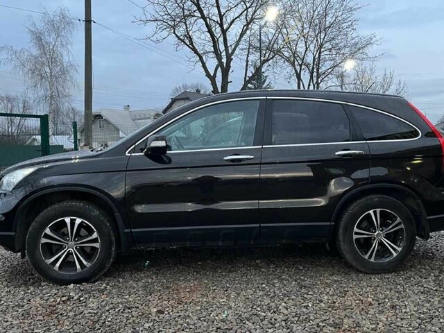 Чорний Хонда СРВ, об'ємом двигуна 2 л та пробігом 245 тис. км за 13100 $, фото 4 на Automoto.ua