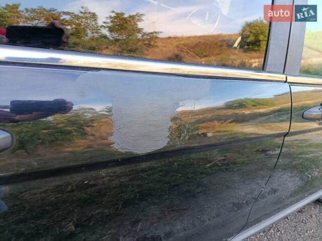 Черный Хонда СРВ, объемом двигателя 2.4 л и пробегом 231 тыс. км за 10500 $, фото 1 на Automoto.ua