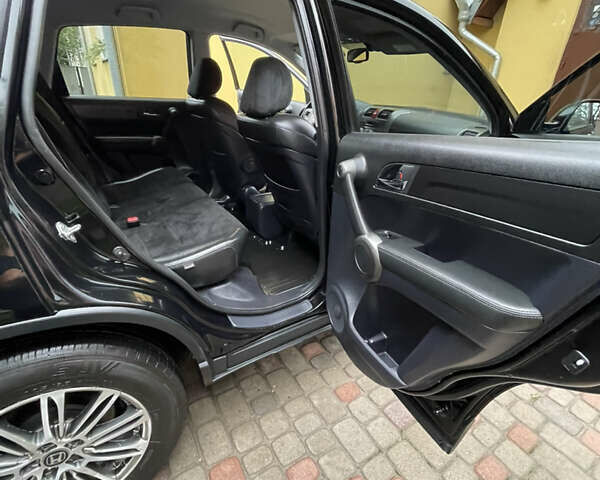 Черный Хонда СРВ, объемом двигателя 2.2 л и пробегом 248 тыс. км за 12700 $, фото 48 на Automoto.ua