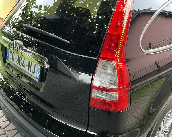 Черный Хонда СРВ, объемом двигателя 2.2 л и пробегом 248 тыс. км за 12700 $, фото 16 на Automoto.ua