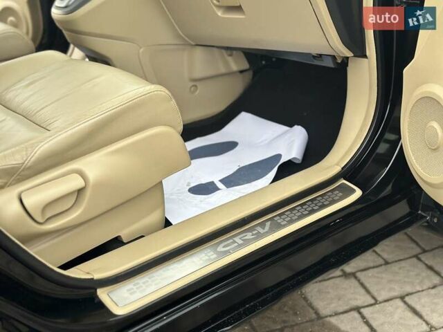 Чорний Хонда СРВ, об'ємом двигуна 2 л та пробігом 181 тис. км за 13777 $, фото 74 на Automoto.ua