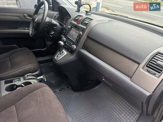 Черный Хонда СРВ, объемом двигателя 2.4 л и пробегом 190 тыс. км за 13000 $, фото 1 на Automoto.ua