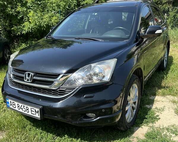 Черный Хонда СРВ, объемом двигателя 2.2 л и пробегом 249 тыс. км за 13400 $, фото 1 на Automoto.ua