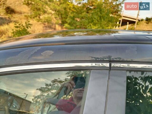 Черный Хонда СРВ, объемом двигателя 2.4 л и пробегом 231 тыс. км за 10500 $, фото 2 на Automoto.ua