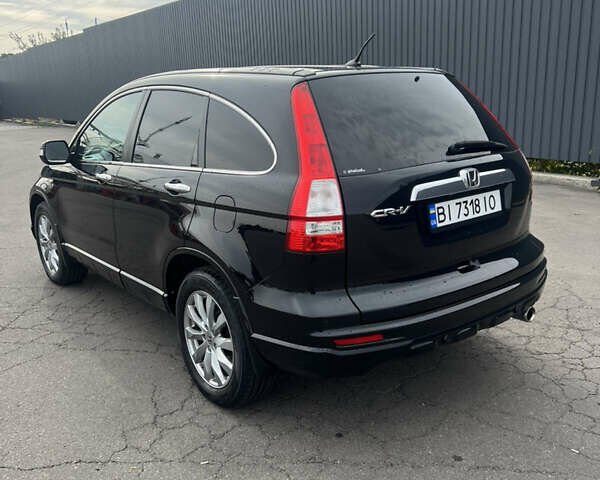 Черный Хонда СРВ, объемом двигателя 2.4 л и пробегом 219 тыс. км за 13300 $, фото 2 на Automoto.ua