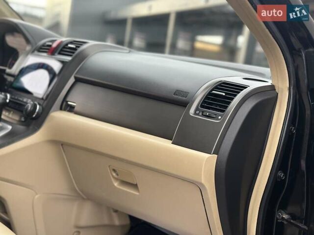 Чорний Хонда СРВ, об'ємом двигуна 2 л та пробігом 181 тис. км за 13777 $, фото 75 на Automoto.ua