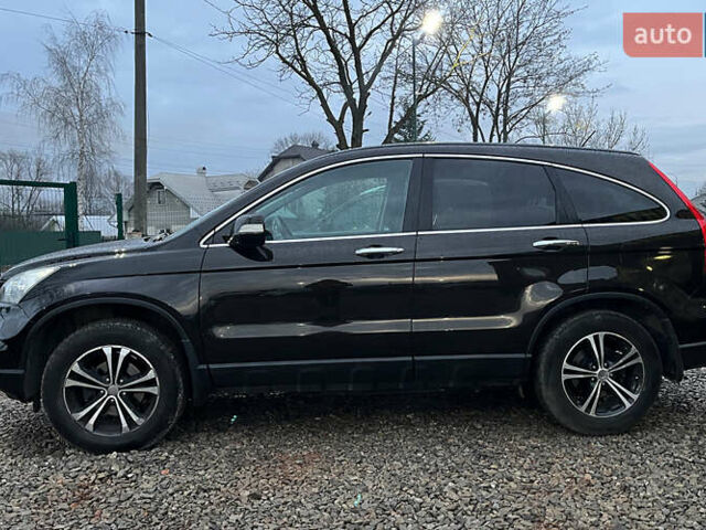 Чорний Хонда СРВ, об'ємом двигуна 2 л та пробігом 245 тис. км за 13100 $, фото 4 на Automoto.ua