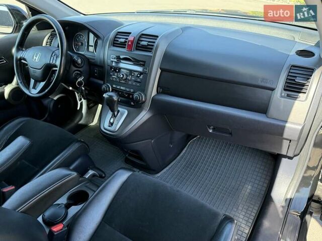 Черный Хонда СРВ, объемом двигателя 2 л и пробегом 225 тыс. км за 13400 $, фото 66 на Automoto.ua