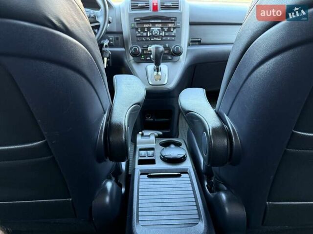 Черный Хонда СРВ, объемом двигателя 2 л и пробегом 225 тыс. км за 13400 $, фото 78 на Automoto.ua