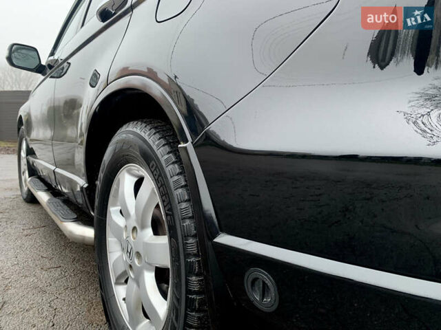 Черный Хонда СРВ, объемом двигателя 2.4 л и пробегом 202 тыс. км за 13700 $, фото 30 на Automoto.ua