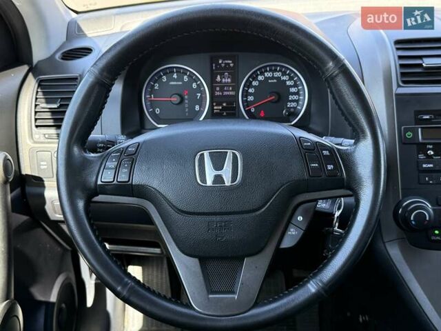 Черный Хонда СРВ, объемом двигателя 2 л и пробегом 225 тыс. км за 13400 $, фото 73 на Automoto.ua