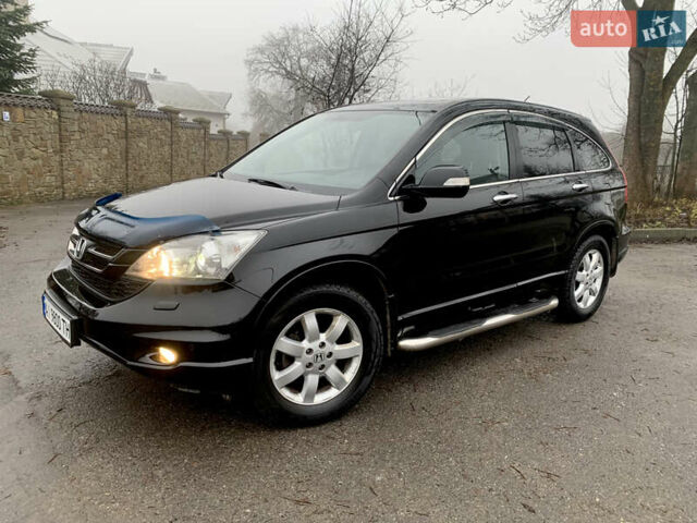 Черный Хонда СРВ, объемом двигателя 2.4 л и пробегом 202 тыс. км за 13700 $, фото 1 на Automoto.ua