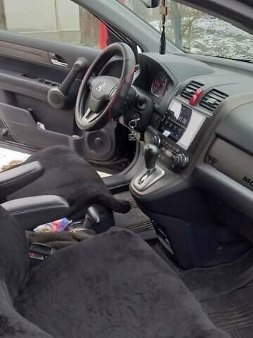 Черный Хонда СРВ, объемом двигателя 2.2 л и пробегом 224 тыс. км за 15900 $, фото 1 на Automoto.ua