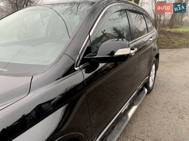 Черный Хонда СРВ, объемом двигателя 2.4 л и пробегом 202 тыс. км за 13700 $, фото 24 на Automoto.ua