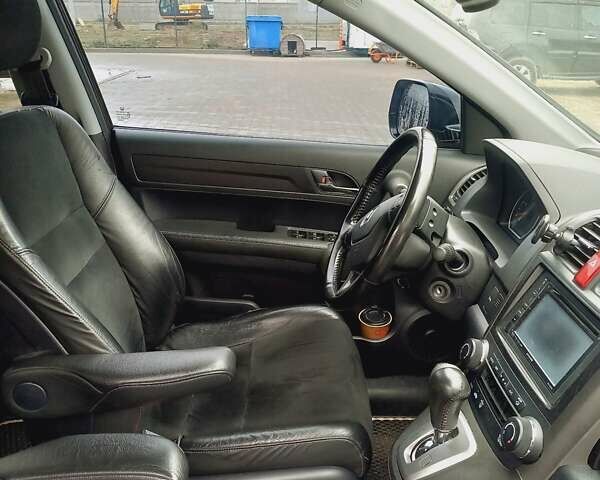 Черный Хонда СРВ, объемом двигателя 2.2 л и пробегом 170 тыс. км за 14000 $, фото 4 на Automoto.ua