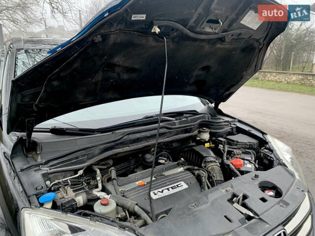Черный Хонда СРВ, объемом двигателя 2.4 л и пробегом 202 тыс. км за 13700 $, фото 31 на Automoto.ua