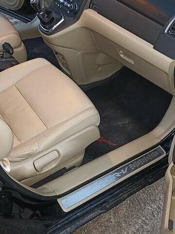 Черный Хонда СРВ, объемом двигателя 2.2 л и пробегом 233 тыс. км за 16700 $, фото 1 на Automoto.ua