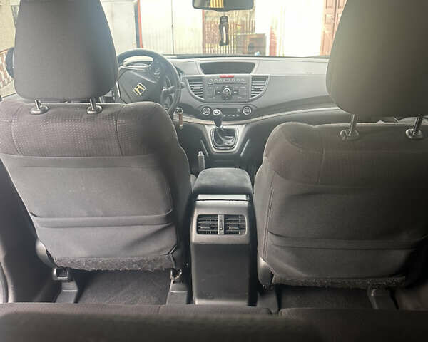 Хонда СРВ 2013 в Тысменице на Automoto.ua Черный Хонда СРВ, объемом двигателя 2.2 л и пробегом 275 тыс. км за 14600 $, фото 23 на Automoto.ua