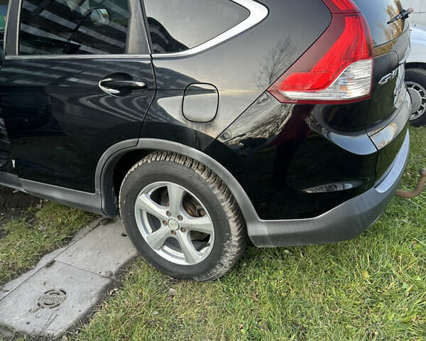 Черный Хонда СРВ, объемом двигателя 2.2 л и пробегом 235 тыс. км за 13000 $, фото 5 на Automoto.ua