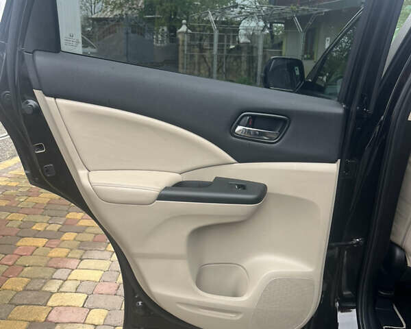 Черный Хонда СРВ, объемом двигателя 2.2 л и пробегом 225 тыс. км за 18000 $, фото 5 на Automoto.ua