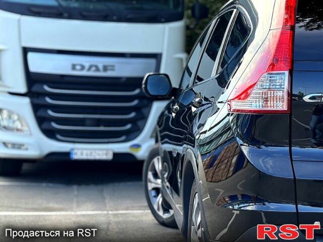 Черный Хонда СРВ, объемом двигателя 2.4 л и пробегом 153 тыс. км за 16500 $, фото 1 на Automoto.ua