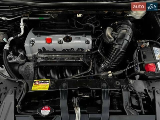 Черный Хонда СРВ, объемом двигателя 2.35 л и пробегом 219 тыс. км за 13560 $, фото 26 на Automoto.ua