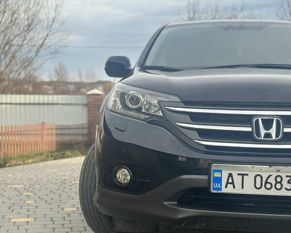 Хонда СРВ 2013 в Тысменице на Automoto.ua Черный Хонда СРВ, объемом двигателя 2.2 л и пробегом 275 тыс. км за 14600 $, фото 32 на Automoto.ua