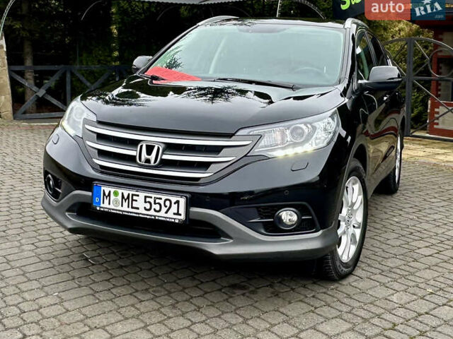 Черный Хонда СРВ, объемом двигателя 2.2 л и пробегом 207 тыс. км за 16485 $, фото 1 на Automoto.ua