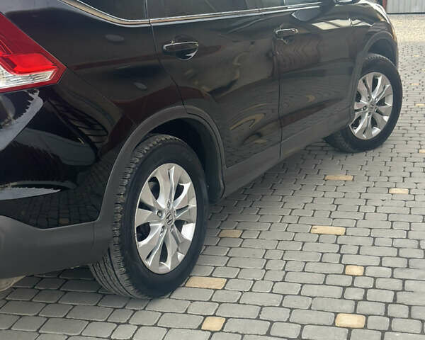 Хонда СРВ 2013 в Тысменице на Automoto.ua Черный Хонда СРВ, объемом двигателя 2.2 л и пробегом 275 тыс. км за 14600 $, фото 3 на Automoto.ua