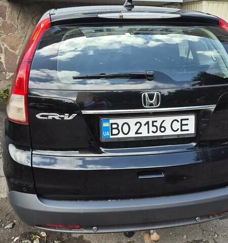 Черный Хонда СРВ, объемом двигателя 1.6 л и пробегом 238 тыс. км за 15400 $, фото 1 на Automoto.ua