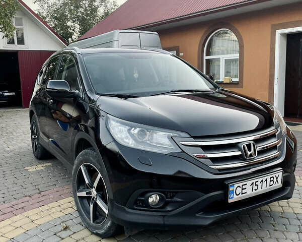 Черный Хонда СРВ, объемом двигателя 2.2 л и пробегом 170 тыс. км за 15700 $, фото 1 на Automoto.ua