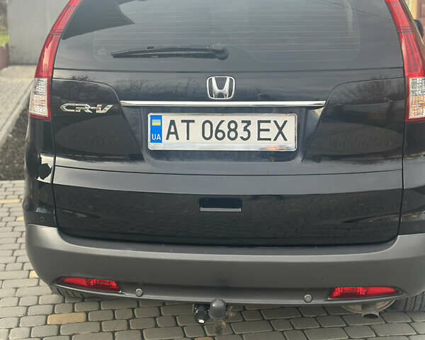 Хонда СРВ 2013 в Тысменице на Automoto.ua Черный Хонда СРВ, объемом двигателя 2.2 л и пробегом 275 тыс. км за 14600 $, фото 27 на Automoto.ua