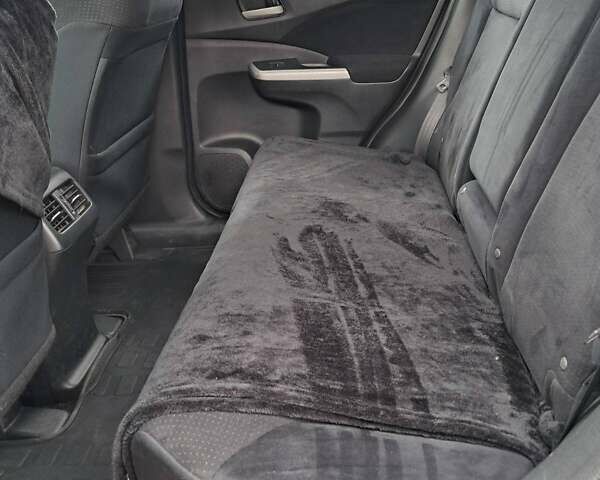 Черный Хонда СРВ, объемом двигателя 2.35 л и пробегом 115 тыс. км за 16500 $, фото 2 на Automoto.ua