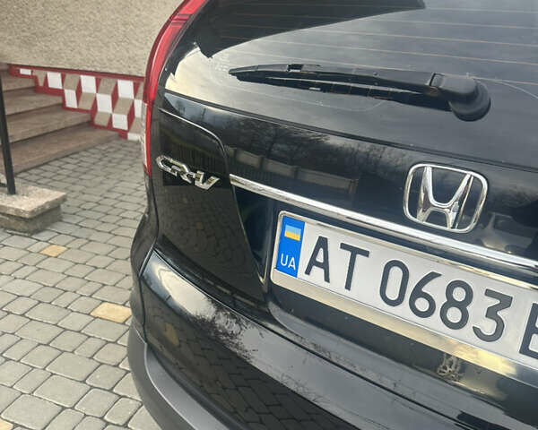 Хонда СРВ 2013 в Тысменице на Automoto.ua Черный Хонда СРВ, объемом двигателя 2.2 л и пробегом 275 тыс. км за 14600 $, фото 5 на Automoto.ua