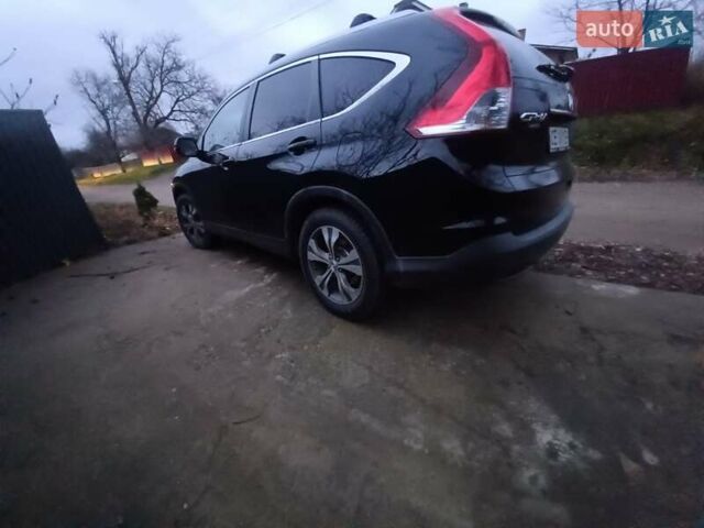 Черный Хонда СРВ, объемом двигателя 2.2 л и пробегом 204 тыс. км за 17600 $, фото 1 на Automoto.ua