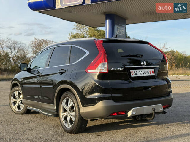 Черный Хонда СРВ, объемом двигателя 2.2 л и пробегом 135 тыс. км за 20500 $, фото 2 на Automoto.ua