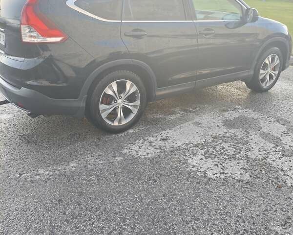 Черный Хонда СРВ, объемом двигателя 2.2 л и пробегом 220 тыс. км за 14000 $, фото 4 на Automoto.ua