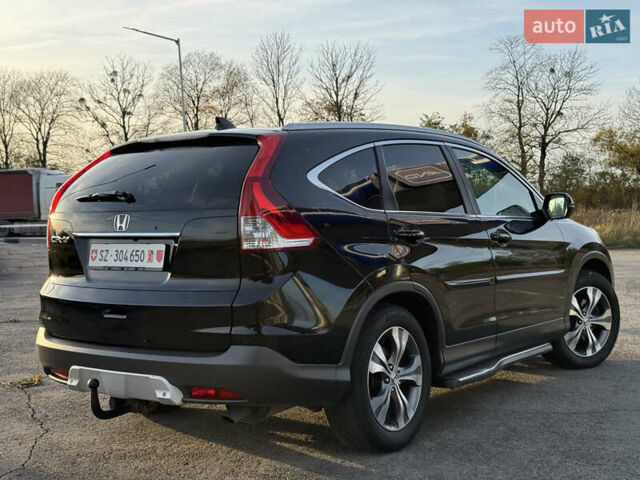 Черный Хонда СРВ, объемом двигателя 2.2 л и пробегом 135 тыс. км за 20500 $, фото 3 на Automoto.ua