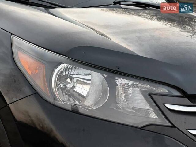 Черный Хонда СРВ, объемом двигателя 2.35 л и пробегом 219 тыс. км за 13560 $, фото 4 на Automoto.ua