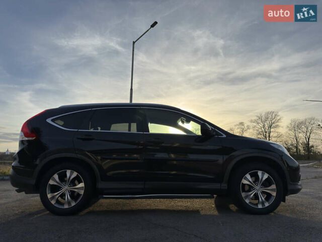 Черный Хонда СРВ, объемом двигателя 2.2 л и пробегом 135 тыс. км за 20500 $, фото 11 на Automoto.ua