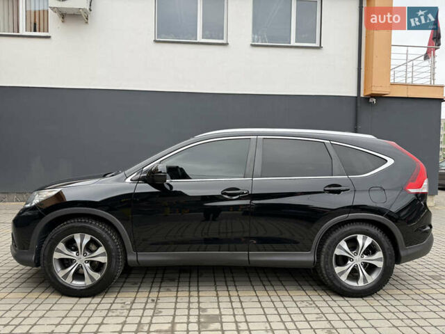 Чорний Хонда СРВ, об'ємом двигуна 2.2 л та пробігом 265 тис. км за 18850 $, фото 13 на Automoto.ua