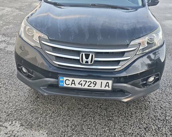 Черный Хонда СРВ, объемом двигателя 2.2 л и пробегом 220 тыс. км за 14000 $, фото 1 на Automoto.ua