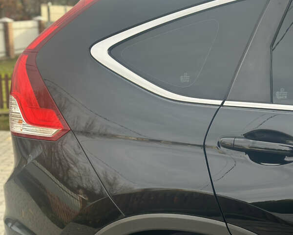 Хонда СРВ 2013 в Тысменице на Automoto.ua Черный Хонда СРВ, объемом двигателя 2.2 л и пробегом 275 тыс. км за 14600 $, фото 30 на Automoto.ua