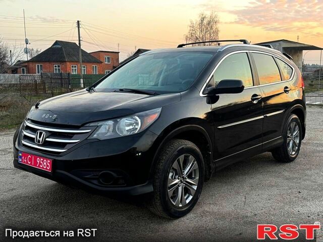 Черный Хонда СРВ, объемом двигателя 2.4 л и пробегом 219 тыс. км за 13450 $, фото 1 на Automoto.ua