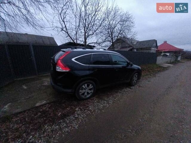 Черный Хонда СРВ, объемом двигателя 2.2 л и пробегом 204 тыс. км за 17600 $, фото 2 на Automoto.ua