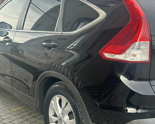 Хонда СРВ 2013 в Тысменице на Automoto.ua Черный Хонда СРВ, объемом двигателя 2.2 л и пробегом 275 тыс. км за 14600 $, фото 31 на Automoto.ua