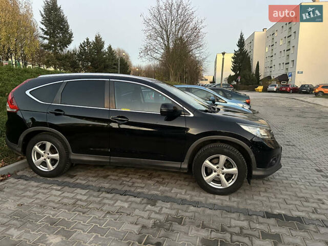 Черный Хонда СРВ, объемом двигателя 2.2 л и пробегом 235 тыс. км за 13000 $, фото 1 на Automoto.ua